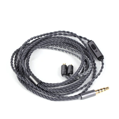 Coiled audio cable with connectors on a white background