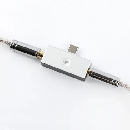 allergo mini DAC with 3.5mm and 4.5 headsets connected to it