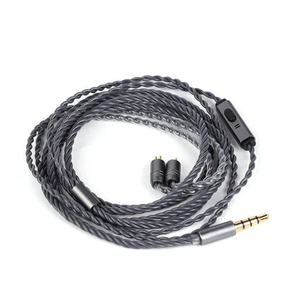 Coiled audio cable with connectors on a white background
