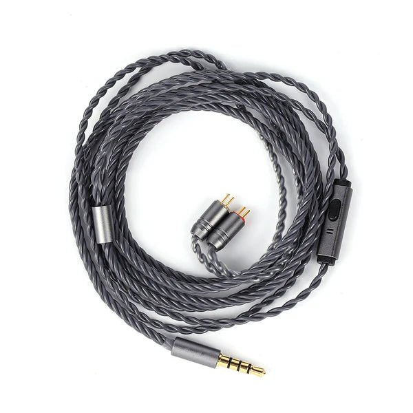 Coiled audio cable with connectors on a white background